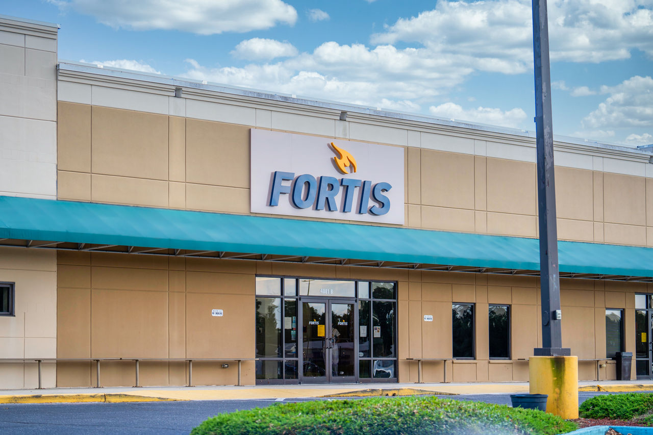 Fortis storefront with teal awning
