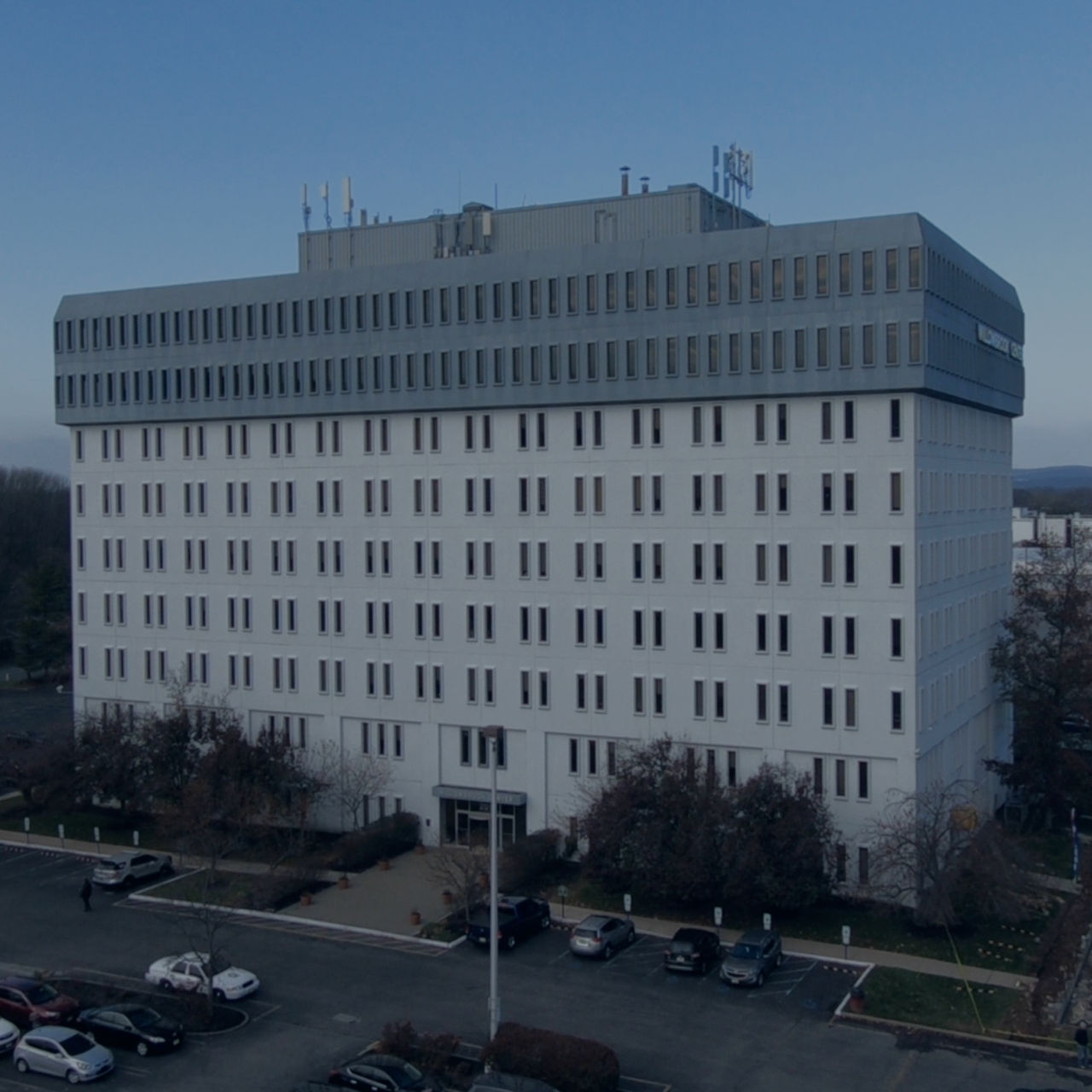 Modern office building with parking lot
