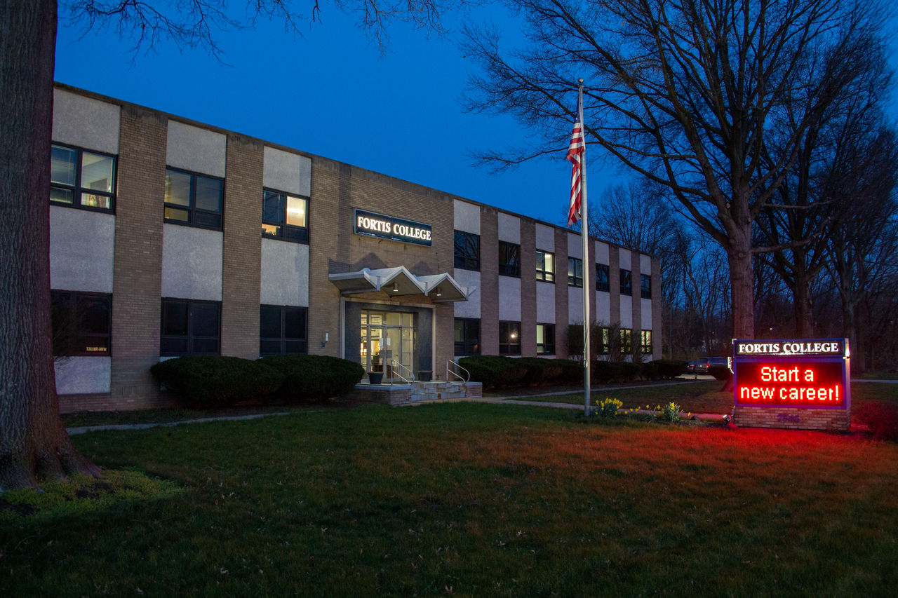 Fortis College building with neon sign